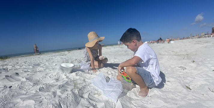 Kids playing on the beach at Sea Spray Resort Siesta Key